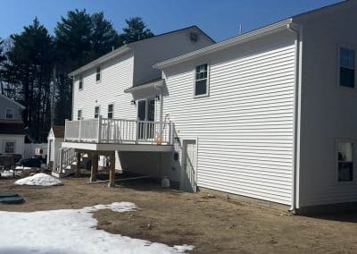 wilmington ma attached garage living space addition rear exterior 01