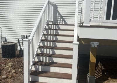 wilmington ma attached garage living space addition rear stairs deck 01
